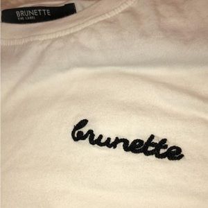 Brunette the label "brunette" white tee.